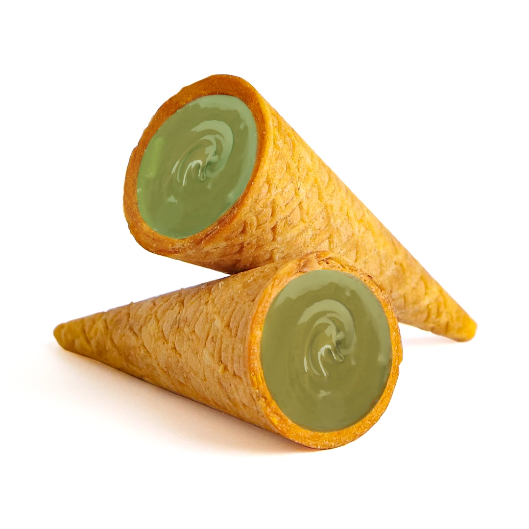 Wafer cone stuffed with pistachio cream